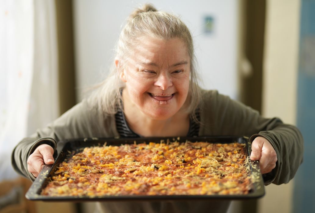 Handicapped,Woman,With,Home,Made,Pizza
