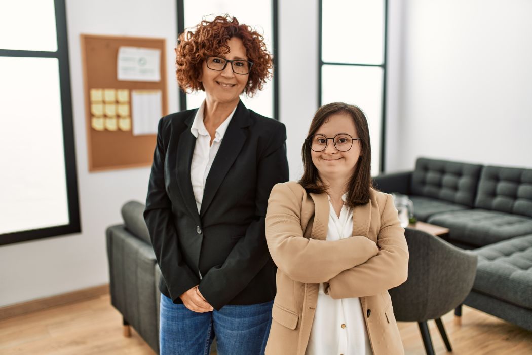 Group,Of,Two,Women,Working,At,The,Office.,Mature,Woman